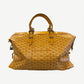 Goyard Boeing 45 yellow duffle bag with hand-painted chevron monogram, leather handles and silver buckle straps