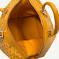 Goyard Boeing 45 yellow duffle interior view showing bright yellow canvas lining and silver hardware