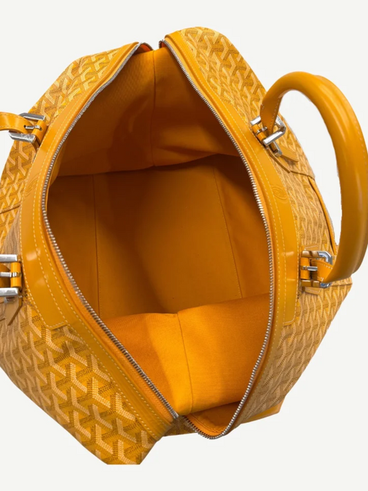Goyard Boeing 45 yellow duffle interior view showing bright yellow canvas lining and silver hardware