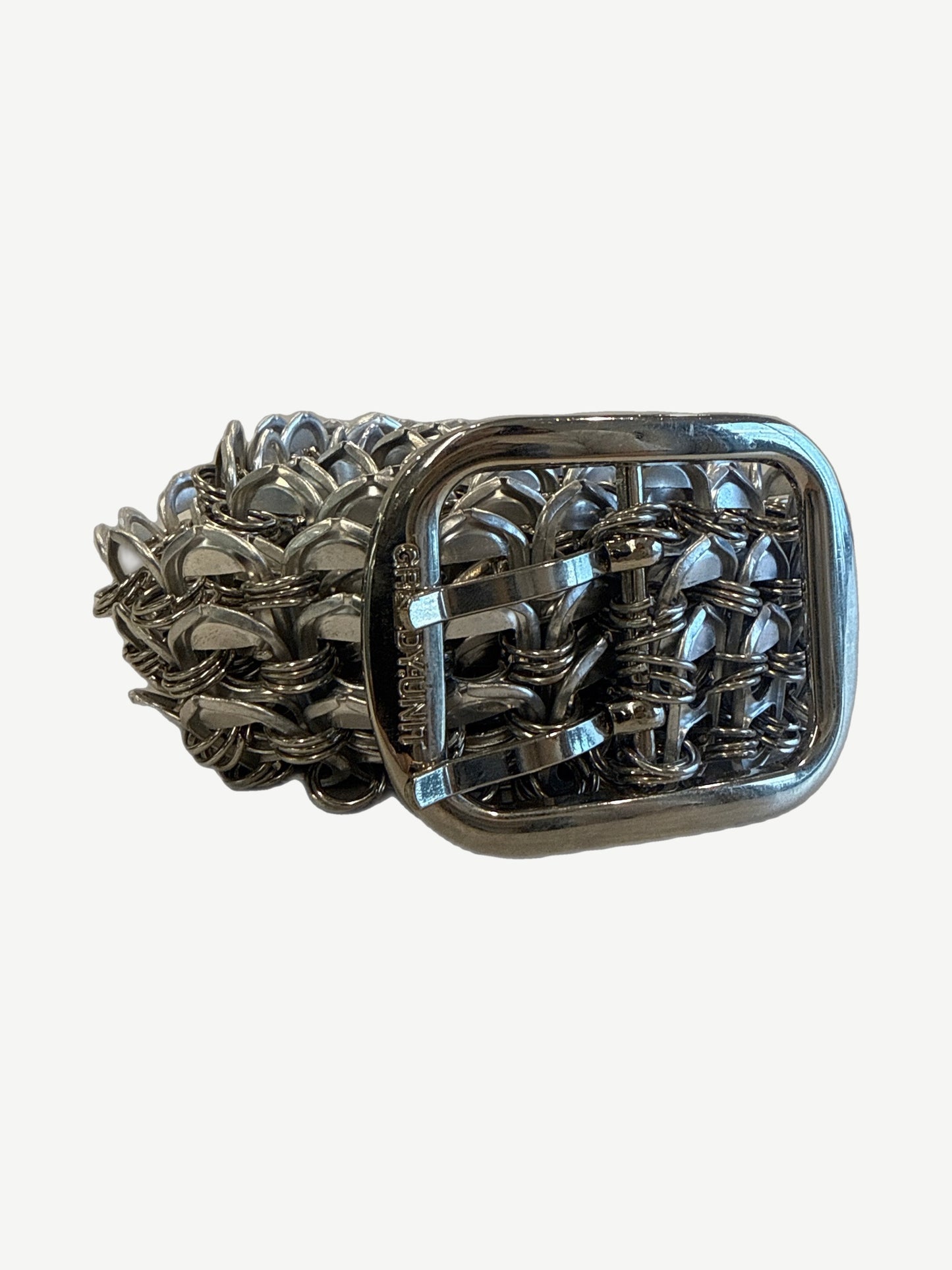 Greedy Unit silver bottle cap belt buckle close-up showing chainmail woven rectangular metal hardware detail