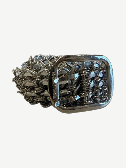 Greedy Unit silver bottle cap belt buckle close-up showing chainmail woven rectangular metal hardware detail