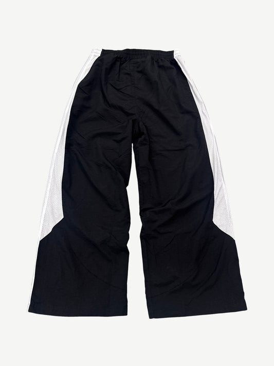 Back of GV Gallery Raspberry Hills black tuxedo sweatpants with contrast tuxedo stripe down each leg.