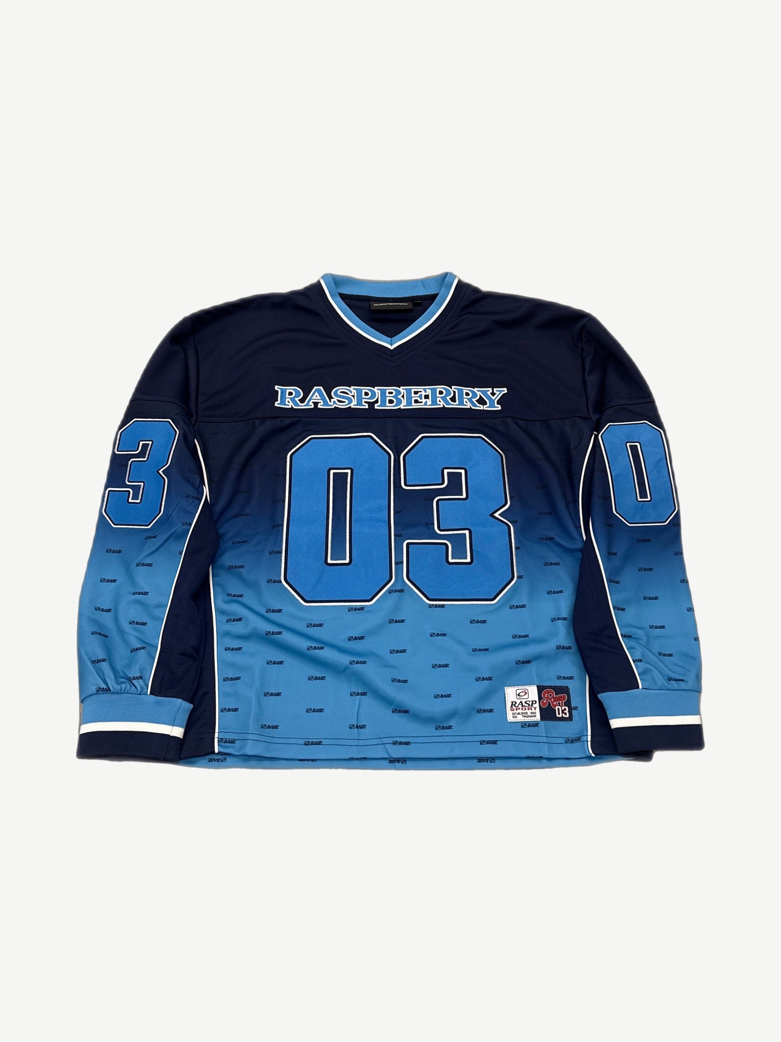 GV Gallery Raspberry Hills blue hockey jersey front with bold 03 numbers and Raspberry varsity chest patch.
