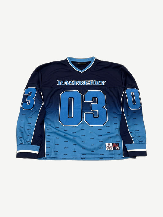GV Gallery Raspberry Hills blue hockey jersey front with bold 03 numbers and Raspberry varsity chest patch.