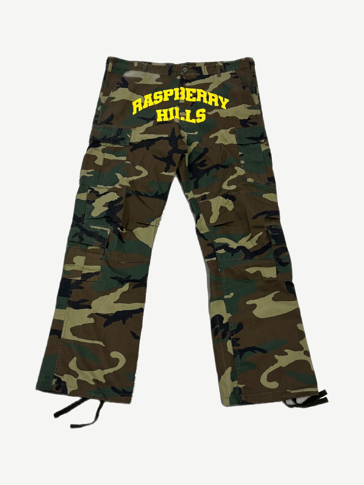 GV Gallery Raspberry Hills woodland camo cargo pants with yellow varsity arch logo print and side pockets
