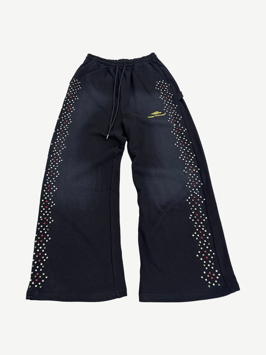 Happy Memories Don't Die HMDD black flared sweatpants with multicolor crystal embellishments along outer legs