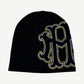 Happy Memories Don't Die HMDD black skater beanie with large gothic outlined embroidery in yellow and white