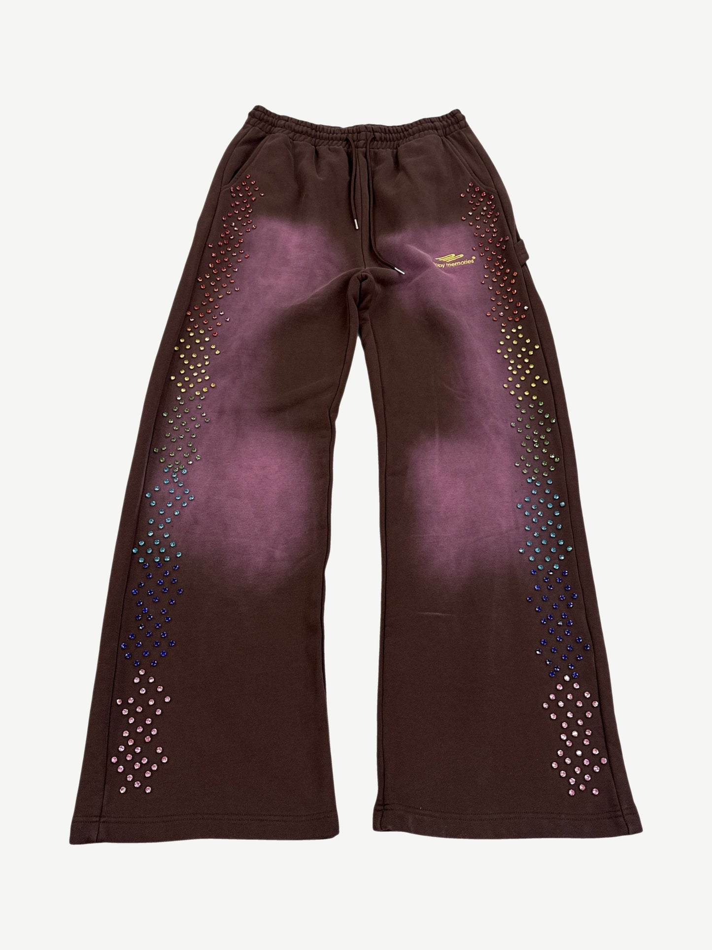 HMDD brown flared sweatpants with rainbow rhinestone studs along legs and faded sun-bleached panels.
