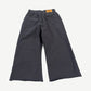 HMDD gray organic cotton 3/4 length sweat shorts back view with tonal logo print detail