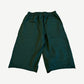 Back of HMDD green Program 3/4 sweat shorts with single right patch pocket and elastic drawstring waist