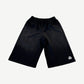 Happy Memories Don't Die black sweat shorts front with drawstring waist and small white HMDD leg logo