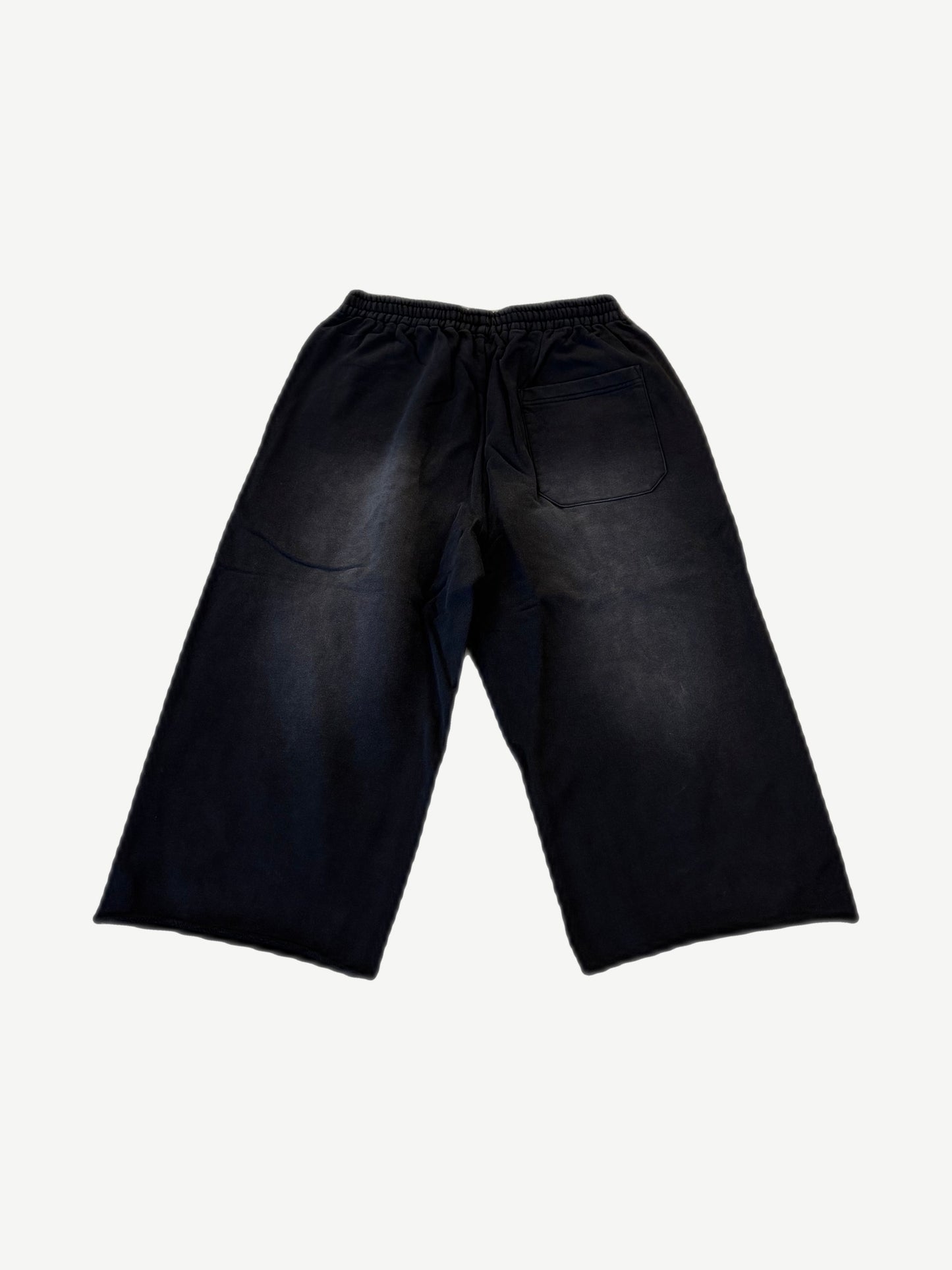Happy Memories Don't Die HMDD black Levee sweat shorts rear view with sun-faded panels and single back pocket
