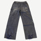 HMDD distressed carpenter pants rear view with utility pockets, paint splatter and shredded hem detail