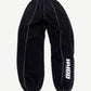 HMDD black baggy seam sweatpants front view with white contrast stitching and registered trademark leg print