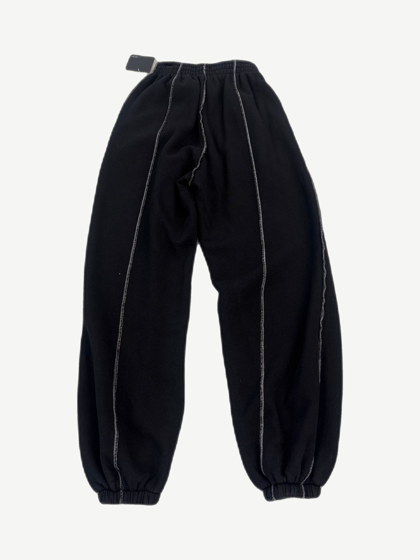 HMDD seam sweatpants back view in black fleece with contrast exposed seam stitching detail