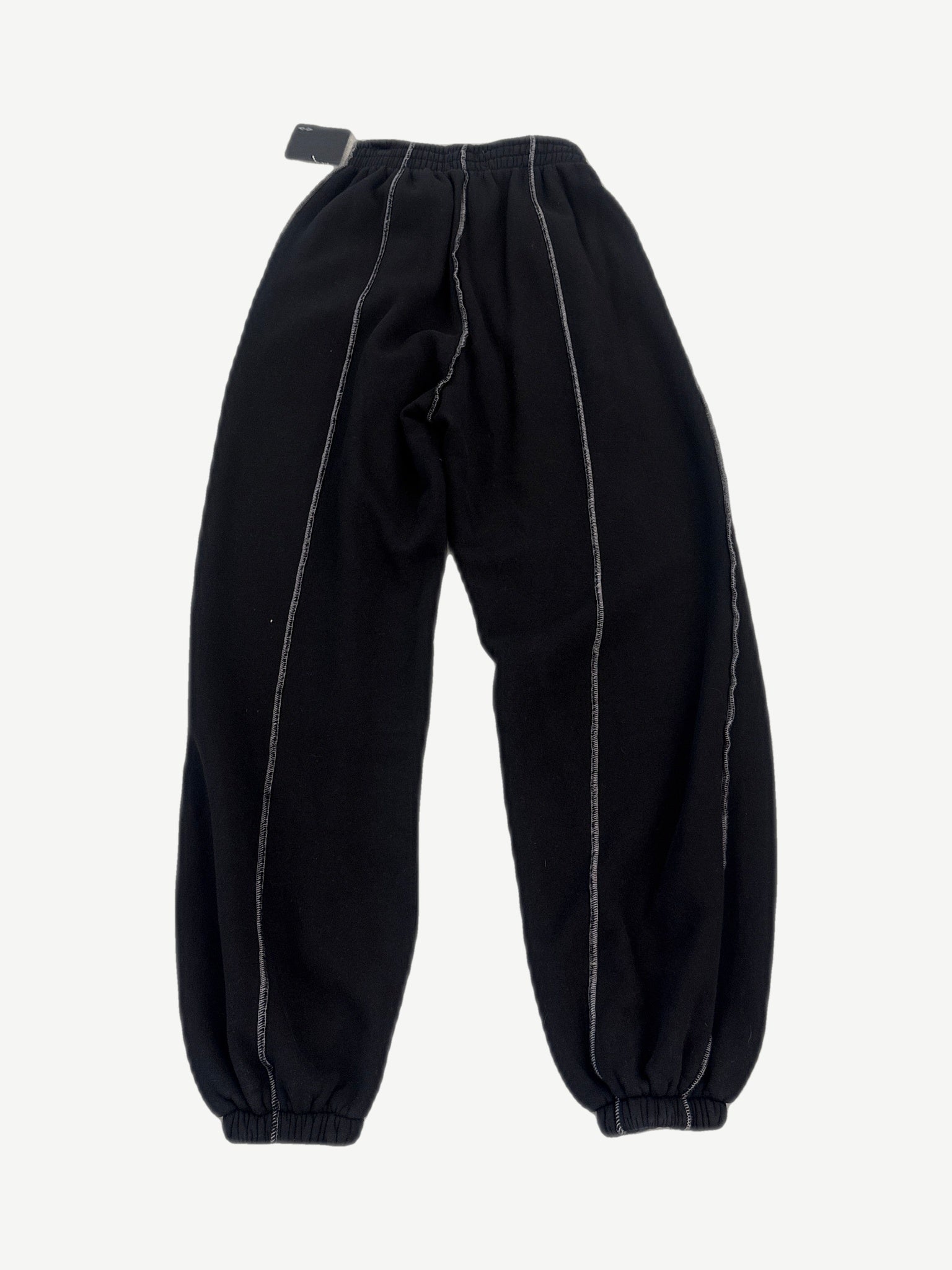 HMDD seam sweatpants back view in black fleece with contrast exposed seam stitching detail