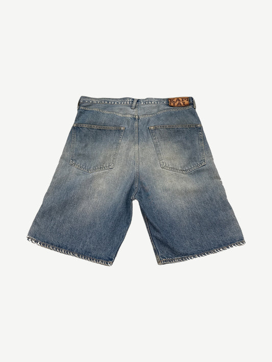 Back of Kapital Cisco denim shorts with leather Kapital patch, twin patch pockets and frayed hem detail