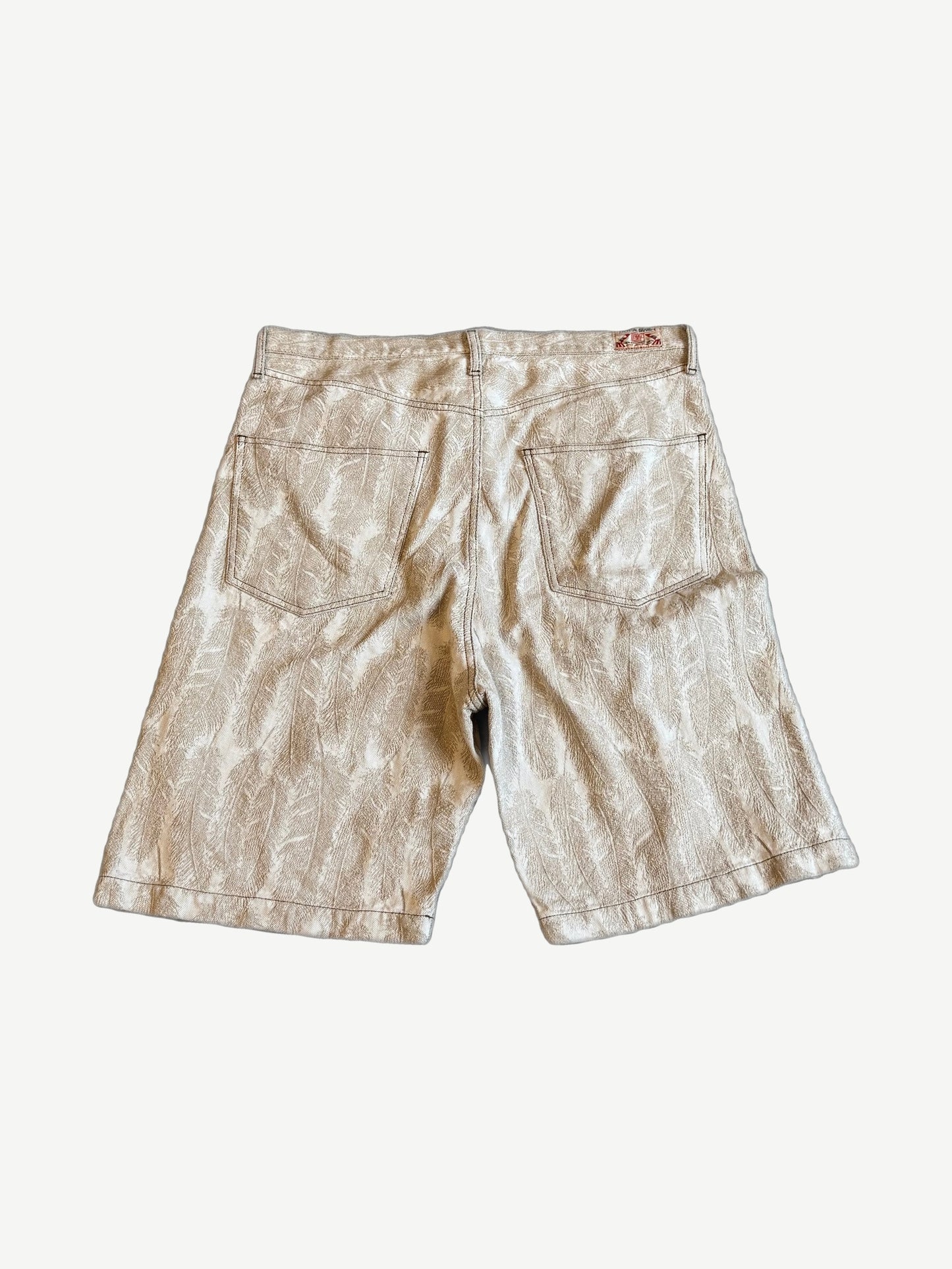 Kapital natural feather Magpie jean shorts back view with patch pockets and brand leather label at waist