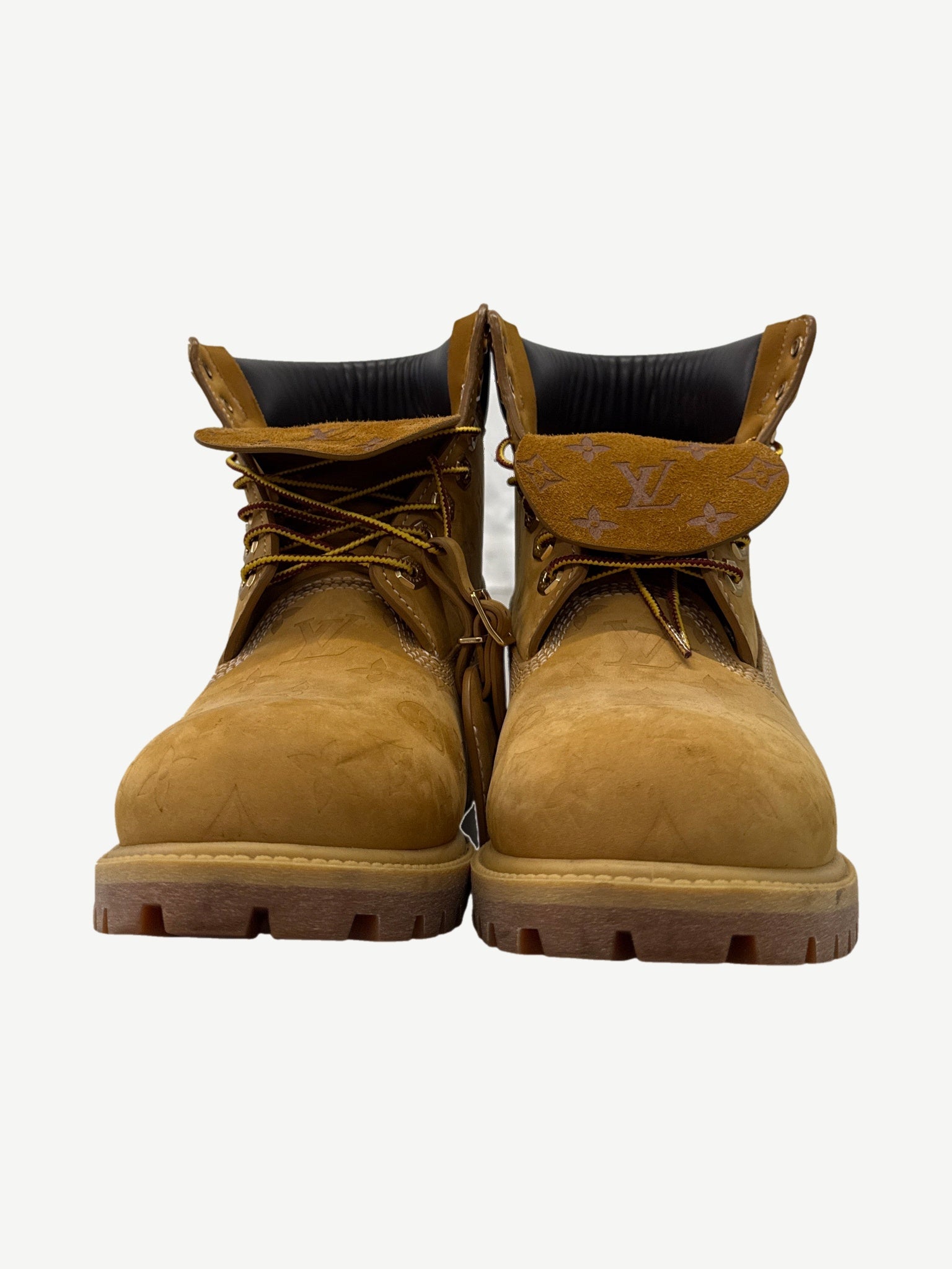 Louis Vuitton Timberland wheat monogram ankle boot back view with embossed LV nubuck and lugged outsole