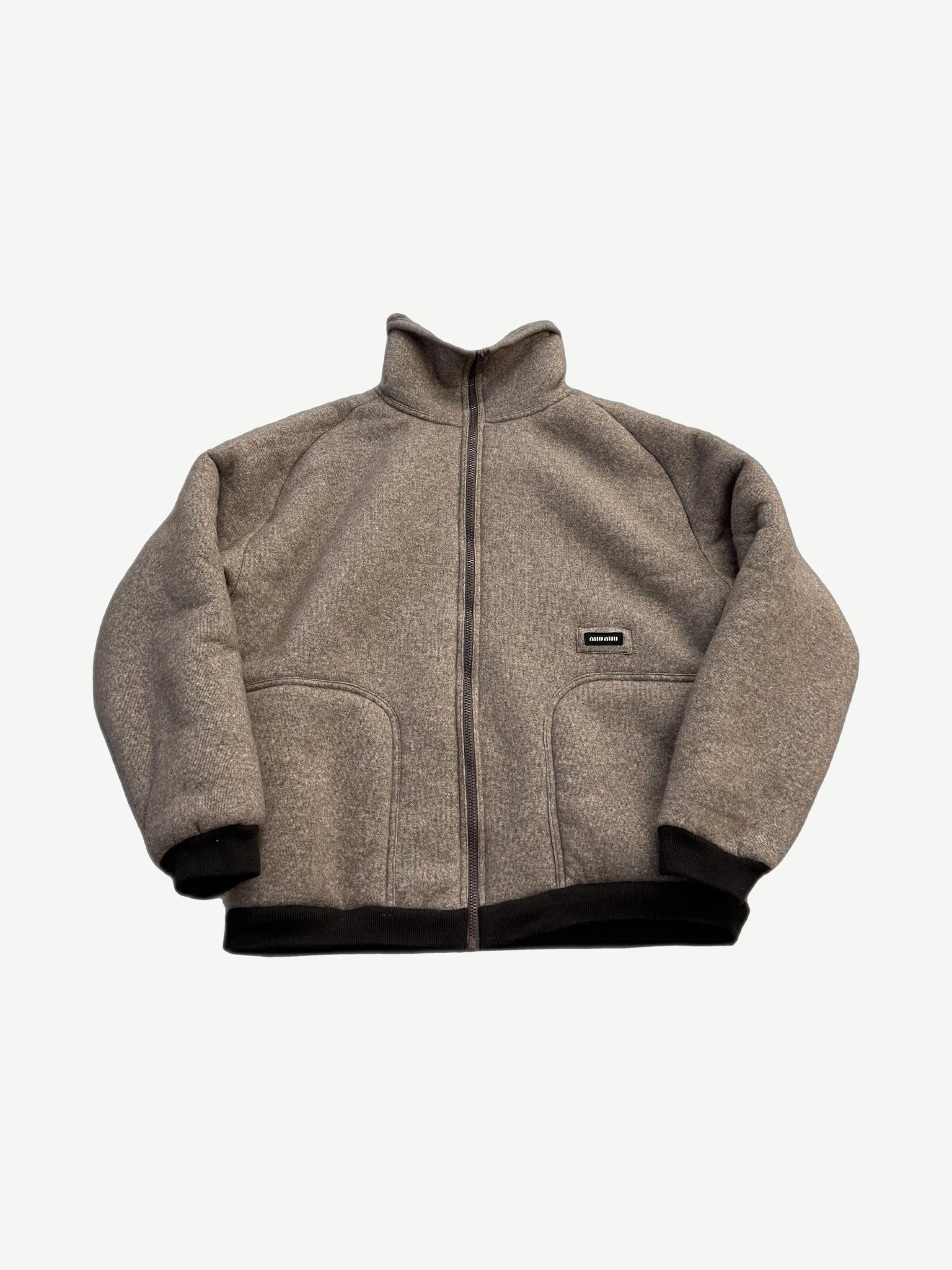 Miu Miu cotton fleece blouson jacket in soft grey with full zipper front, ribbed collar, cuffs and hem.