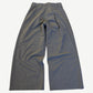 Back view of MM6 Maison Margiela gray wide-leg cotton trousers with rear welt pockets and belt loops