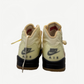 Off-White Jordan 5 Sail rear view showing Nike Air heel branding, black midsole stripe and gum sole