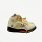 Off-White Air Jordan 5 Retro Sail sneaker side profile with deconstructed translucent paneling and red 23 detail