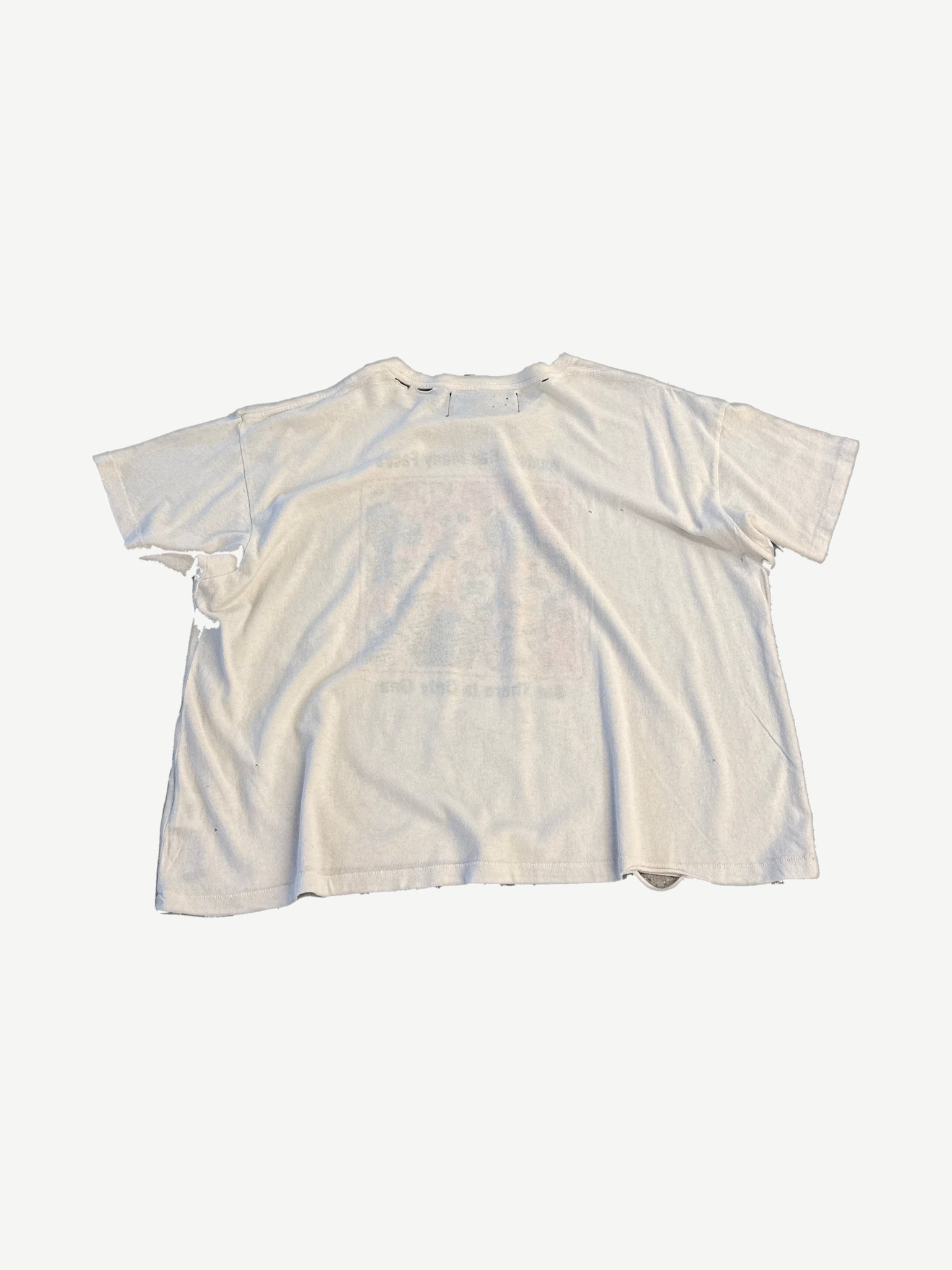 Paly Hollywood Anxiety tee back view in distressed white cotton with thrashed edges and visible holes