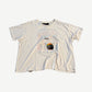Paly Hollywood Anxiety tee front in distressed white with center anxious face graphic and torn hem