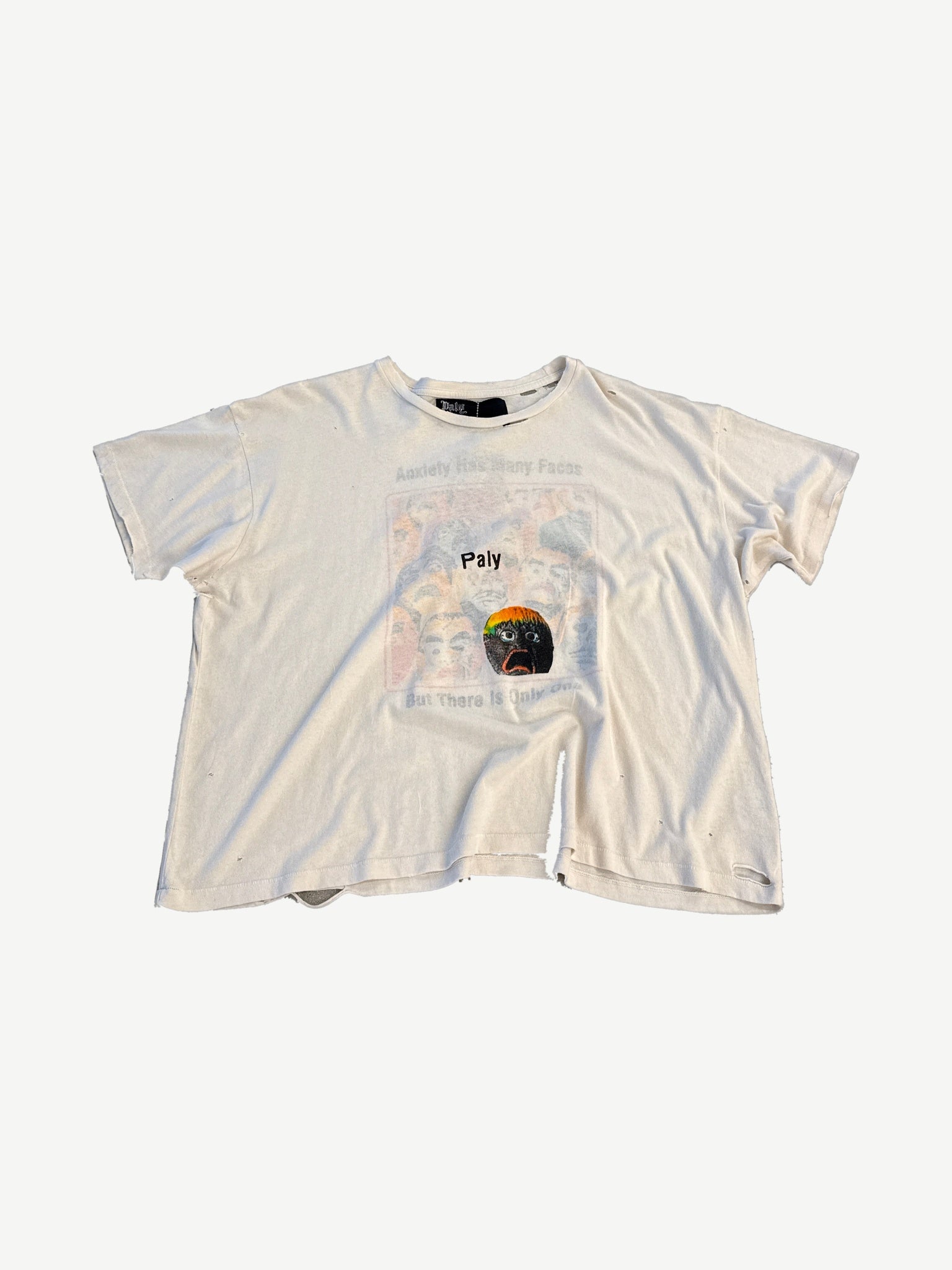 Paly Hollywood Anxiety tee front in distressed white with center anxious face graphic and torn hem
