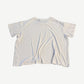 Paly Hollywood Arigo tee back view in distressed white with frayed edges and oversized boxy cotton silhouette