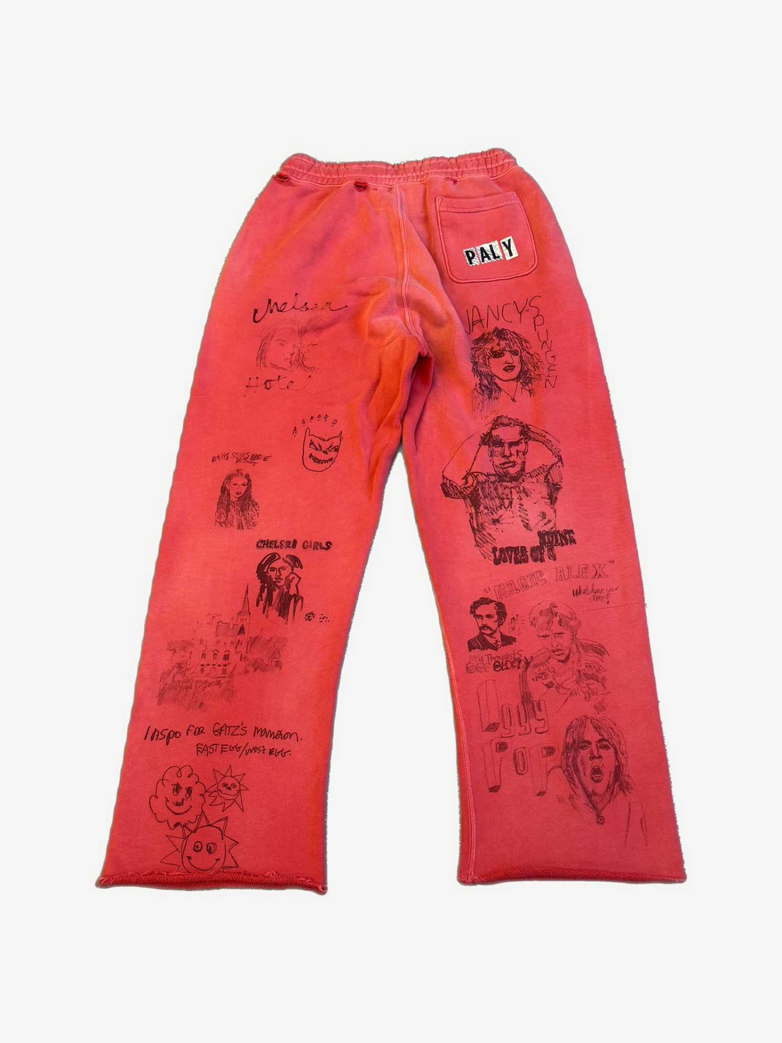 Back of Paly Hollywood Chelsea Hotel red sweatpants with sketch portraits, Paly patch and faded wash.