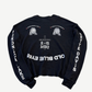 Back of Paly Hollywood black Canteen thermal long sleeve showing waffle texture and rib-knit cuffs.