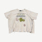 Paly Hollywood distressed cream tee with Celebrity Star Celery Juice Cleanse print and raw cropped hem