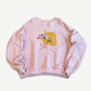 Paly Hollywood pink crewneck with yellow paint-splatter Sum 1 In Hollywood Luvs Me chest graphic, ribbed cuffs.