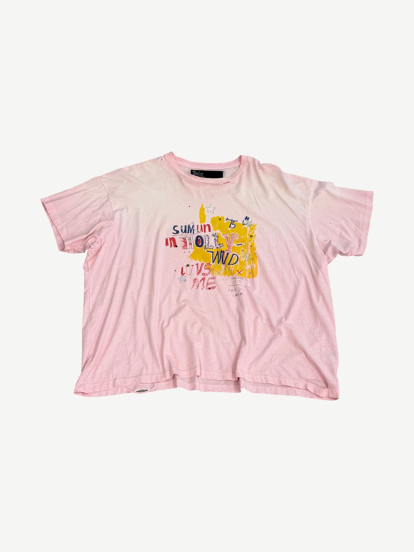 Paly Hollywood washed pink tee with Sum 1 In Hollywood Luvs Me ransom-style collage graphic on chest