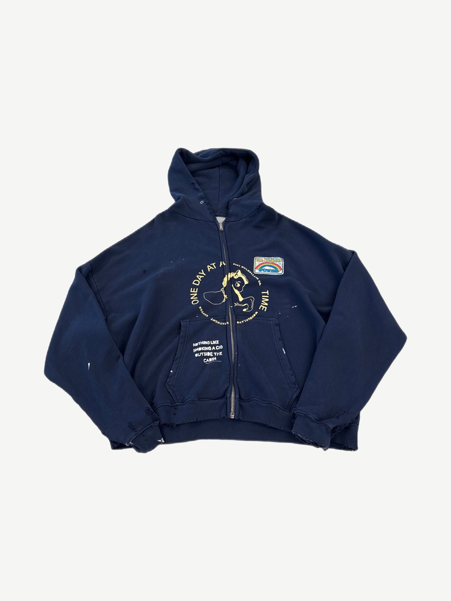 Paly Hollywood Treatment Center zip up hoodie in distressed navy with One Day At A Time print and rainbow patch.