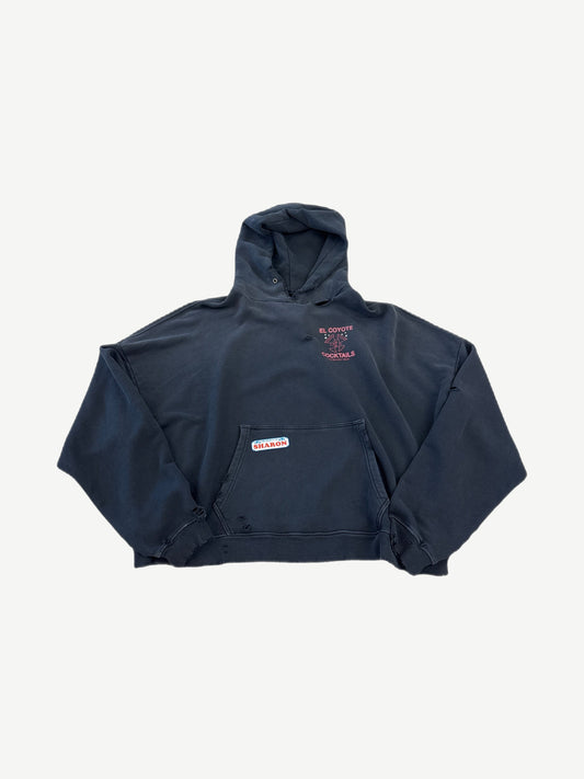 Paly Hollywood Valley of Dolls cropped navy hoodie with El Coyote Cocktails chest print and Sharon pocket patch