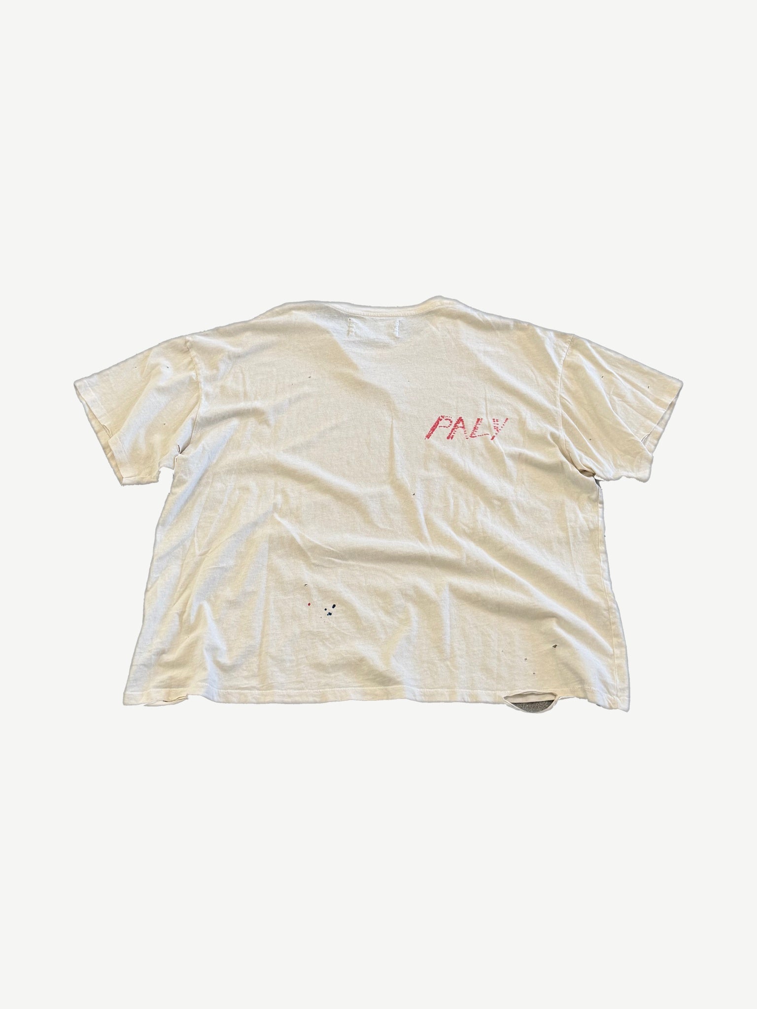 Paly Hollywood cream tee back view with small red Paly script print on upper back