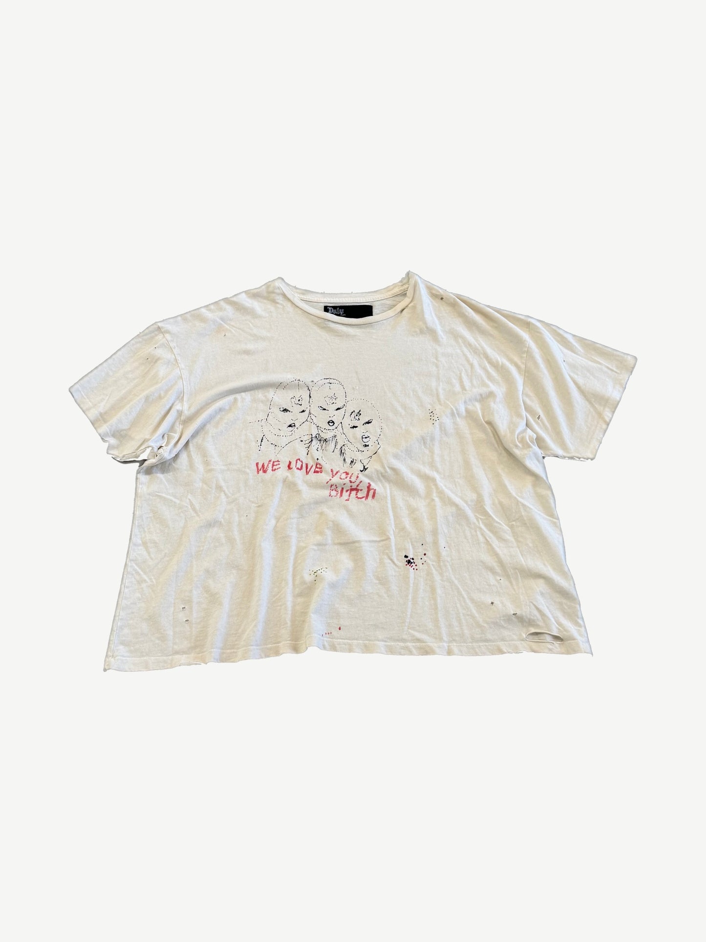 Paly Hollywood cream tee with We Love You Bitch hand-drawn faces print and paint splatter