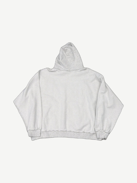 Back of Balenciaga light grey inside out hoodie showing oversized boxy fit and raw inverted seam detailing
