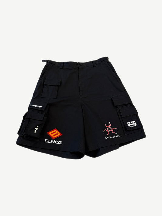 Balenciaga black gamer cargo shorts front with multi pocket utility design and BLNCG biohazard logo prints