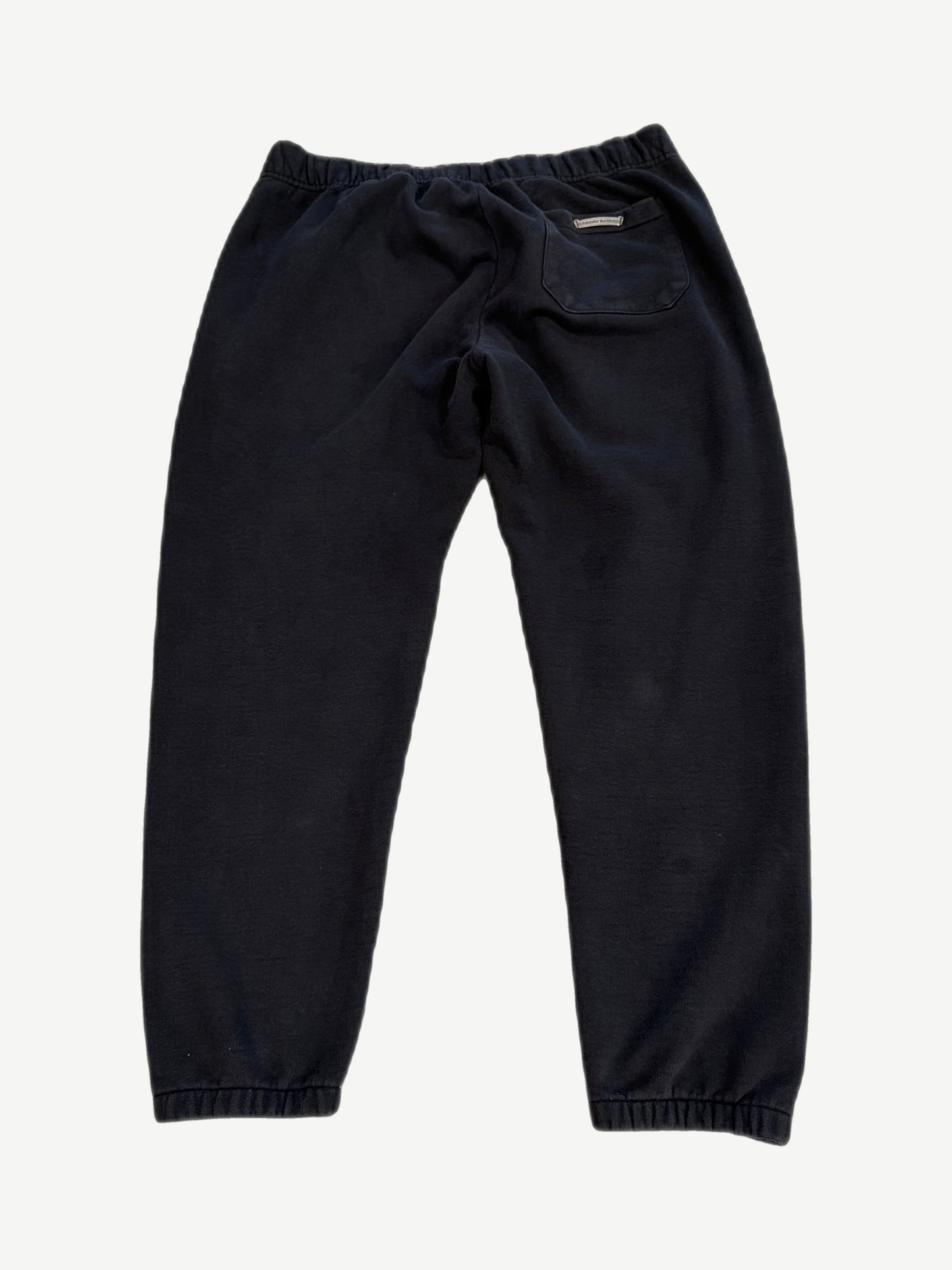 Chrome Hearts black Paper Jam sweatpants back view with rear pocket and woven scroll label