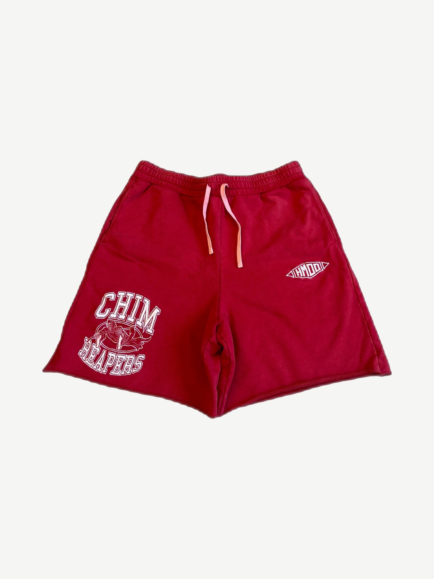 HMDD Happy Memories Don't Die red Chim Reapers mesh shorts with white screen-printed reaper graphic at leg.