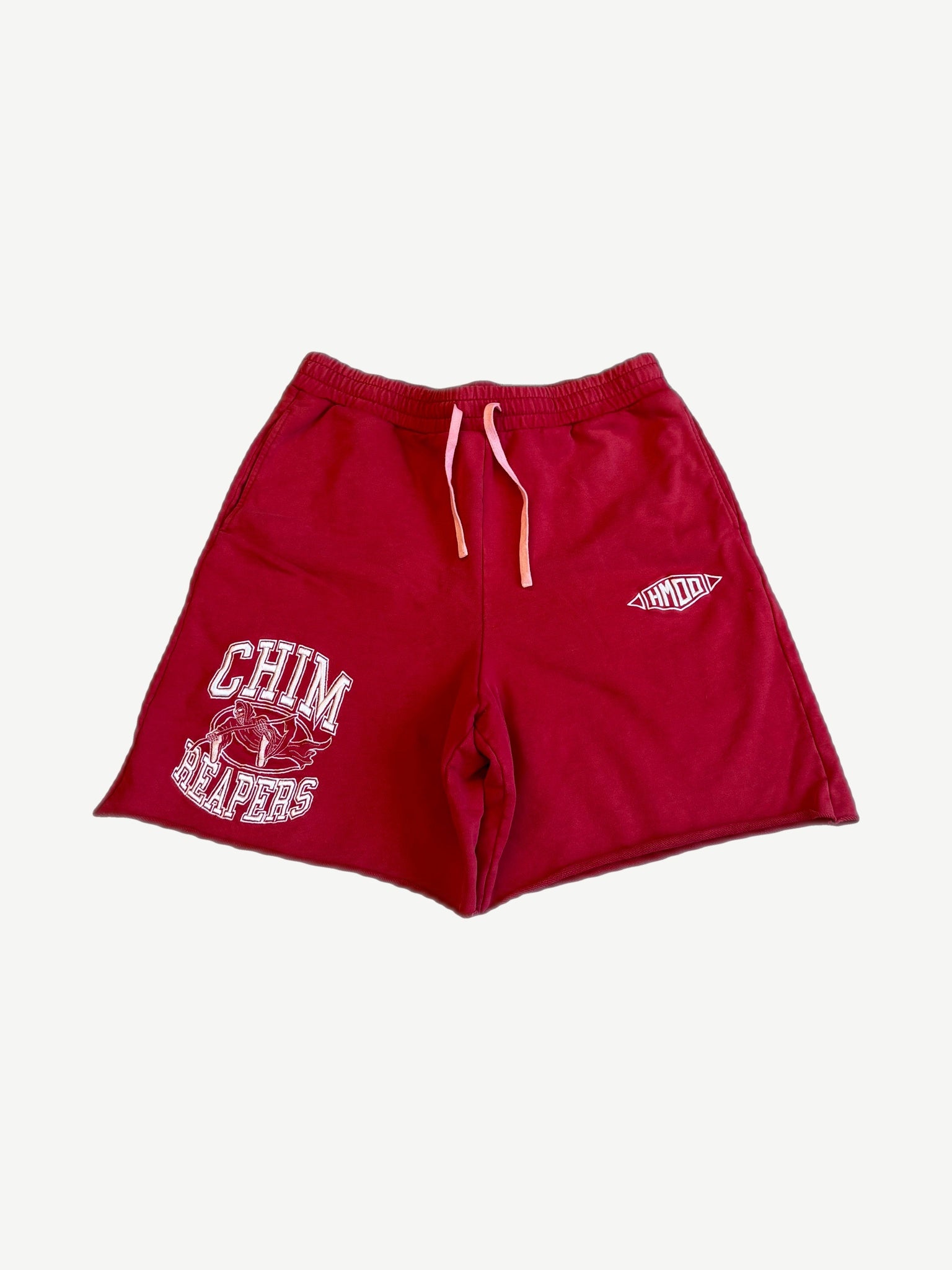 HMDD Happy Memories Don't Die red Chim Reapers mesh shorts with white screen-printed reaper graphic at leg.