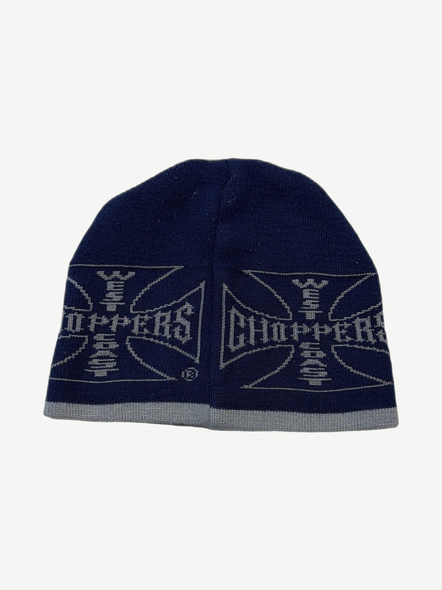 WCC navy beanie alternate angle, ribbed knit acrylic with flame-style WCC cross embroidery in royal blue.