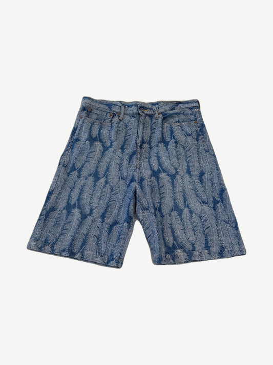 Kapital blue denim jean shorts front with allover woven magpie feather jacquard pattern.