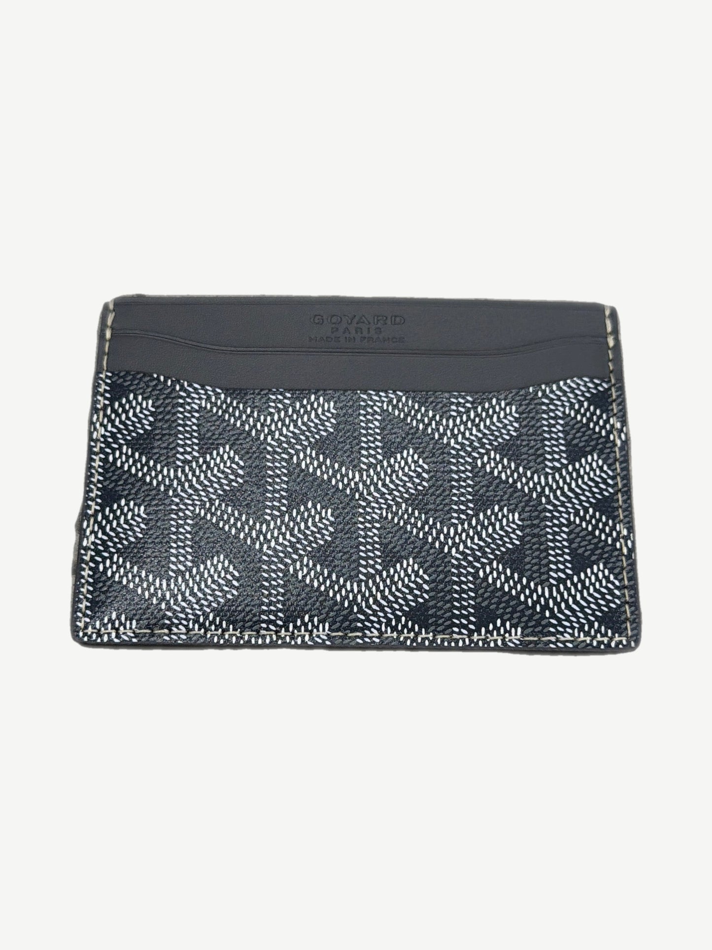 Goyard gray Saint Sulpice card holder open view showing interior card slots and chevron canvas lining