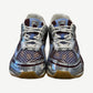 Bottega Veneta Orbit sneakers front view with blue tongue, white laces and silver chrome midsole detail.