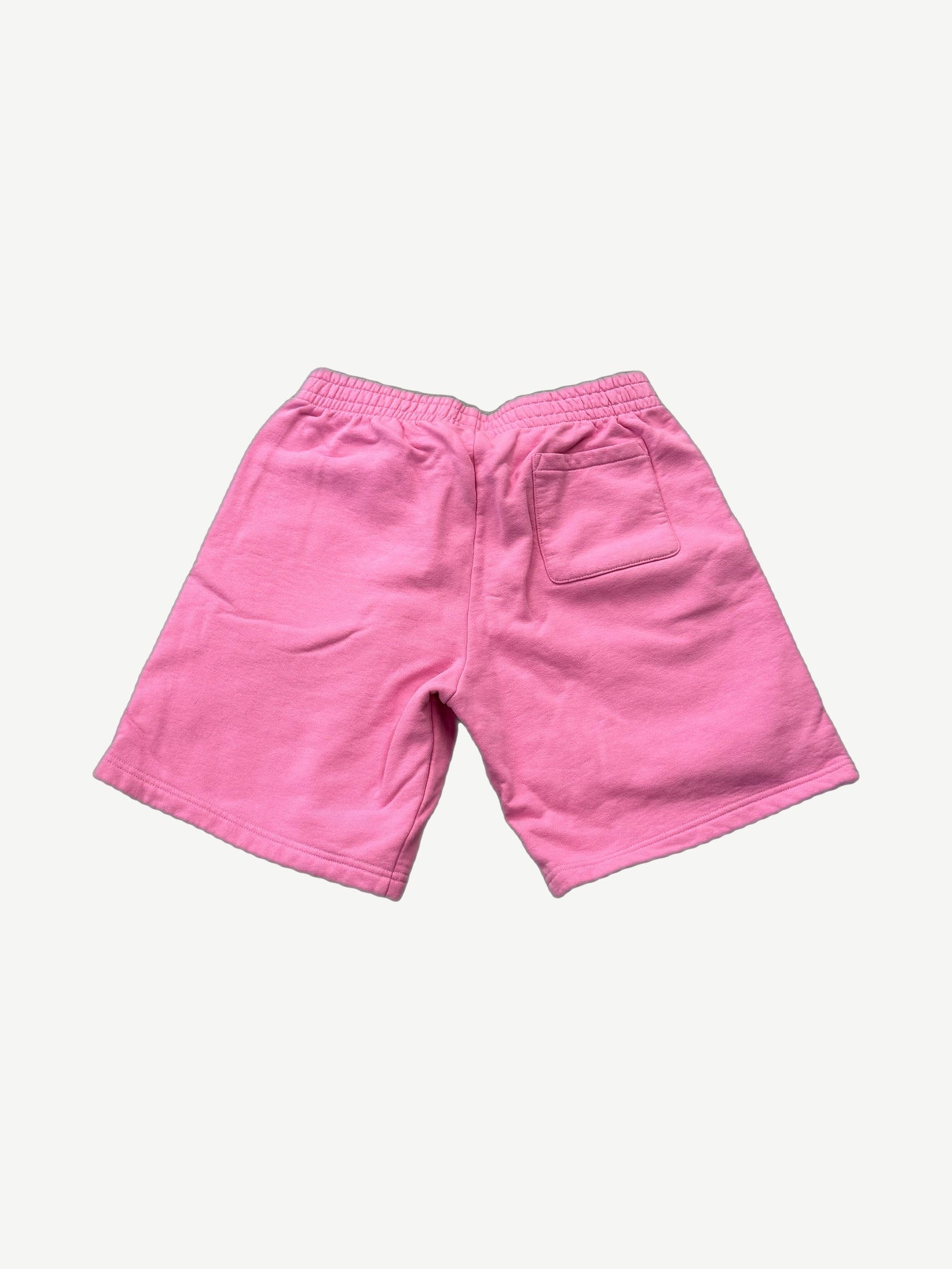 Supreme pink small box logo sweatshorts back view showing single rear patch pocket